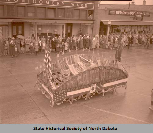 Band Day parade 1940s, Williston American Legion float, Williston, N.D.